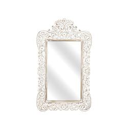 Miroir en bois ajouré avec touffe