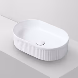 Lavabo à poser ovale CORINTO OVALO Nos lavabos sont fabriqués en céramique de haute qualité, matériau obtenu par la combinais ...