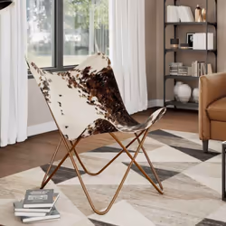 Notre fauteuil papillon vintage, fabriqué en cuir de vachette véritable, a été conçu de manière ergonomique pour une relaxati ...