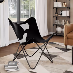 Notre fauteuil papillon de style vintage, fabriqué en cuir de vachette véritable, a été conçu de manière ergonomique pour une ...