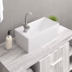 Ce lavabo ajoute un style élégant à toute salle de bains ou meuble-lavabo pour un attrait moderne et minimaliste. Matériau en ...