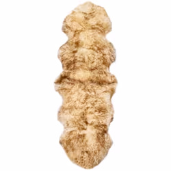 Créez un espace invitant et un espace de vie chaleureux avec notre confortable tapis en peau véritable de mouton. Le tapis es ...