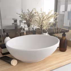 Notre lavabo de forme ovale, en céramique de première qualité, est un supplément élégant à toute salle de bain, toilette ou c ...