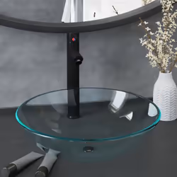 Ce lavabo de salle de bain à vasque circulaire avec robinet et drain à poussoir est conçu pour être placé sur le comptoir et  ...