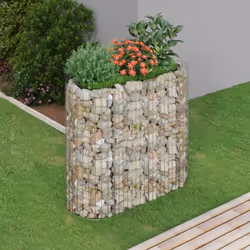 Ce lit surélevé en gabion est un moyen pratique de créer une bordure solide pour les fleurs dans votre jardin et sur votre te ...