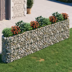 Ce lit surélevé en gabion est un moyen pratique de créer une bordure solide pour les fleurs dans votre jardin et sur votre te ...