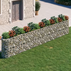Ce lit surélevé en gabion est un moyen pratique de créer une bordure solide pour les fleurs dans votre jardin et sur votre te ...
