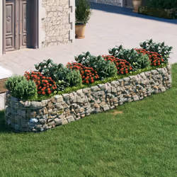 Ce lit surélevé en gabion est un moyen pratique de créer une bordure solide pour les fleurs dans votre jardin et sur votre te ...
