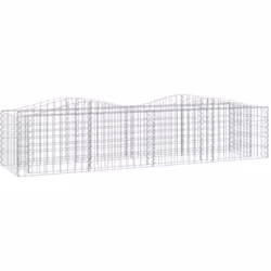 Ce lit surélevé à gabions arqué est un moyen pratique de créer une bordure solide pour les fleurs dans votre jardin et sur vo ...