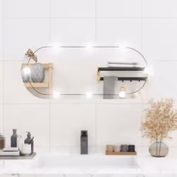 Le miroir mural élégant avec lumières LED ajoute une touche de style contemporain et fournit une lumière vive à votre pièce ! ...