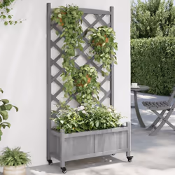 Cette jardinière en bois avec treillis et roues est un excellent choix pour les plantes grimpantes dans votre jardin, sur vot ...