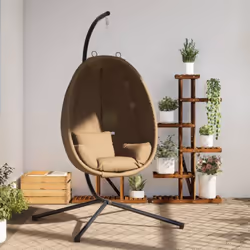 Asseyez-vous et profitez d'un moment de détente dans votre espace de vie avec cette fascinante chaise suspendue en forme d'œu ...