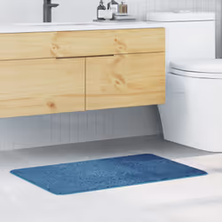 Ce tapis de bain, avec sa belle couleur bleue et son polyester moelleux, donne un coup de frais à votre salle de bain tout en ...