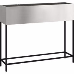 Ce grand pot rectangulaire en métal donne une touche moderne et est solide pour tes plantes. Son design en inox chic apporte  ...
